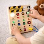 Tablero sensorial LED con múltiples interruptores y elementos luminosos