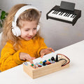 Toy - Montessori-Inspired Musical Activity Board